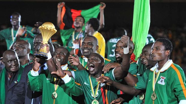 We are the champions: The Zambian team is overjoyed after edging out Ivory Coast on penalties.