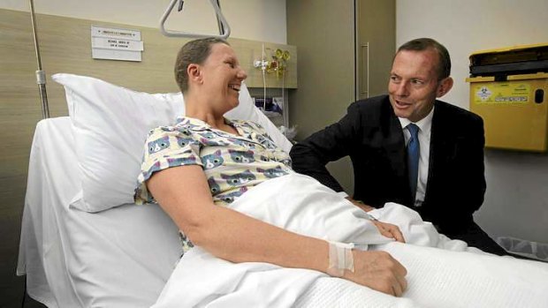 New order: Tony Abbott, with breast cancer patient Hilary King, announces funding for chemotherapy infusion drugs at The Mater.