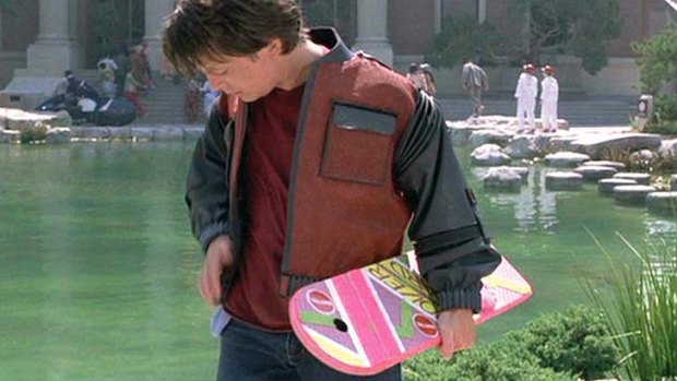 Michael J. Fox in Back to the Future with a hoverboard.