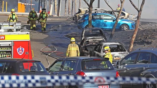 Aftermath: Burnt out cars after the Olympic Park fire.