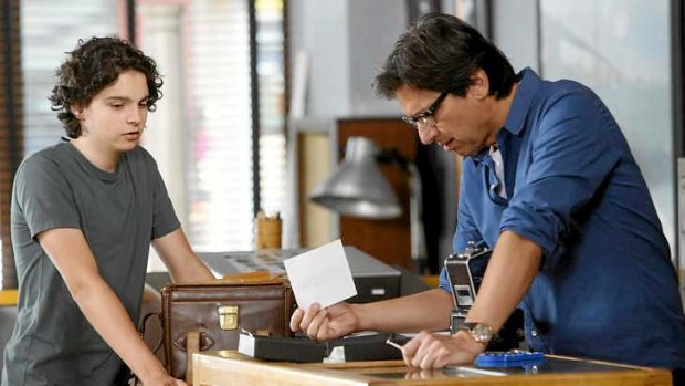 Max Burkholder as Max Braverman and Ray Romano as Hank Rizzoli in <i>Parenthood</i>.