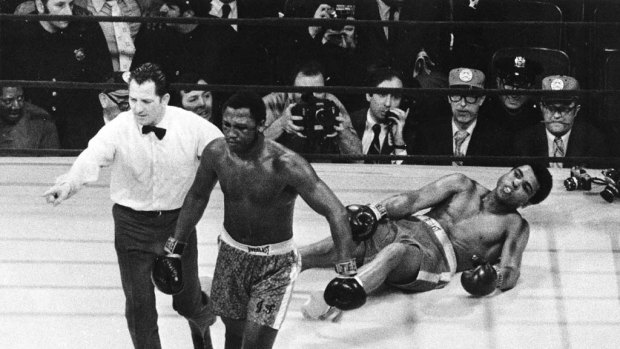 40 years ago today ...  Joe Frazier is  directed to the ropes by referee Arthur Marcante after knocking down Muhammad Ali during the 15th round of the title bout.