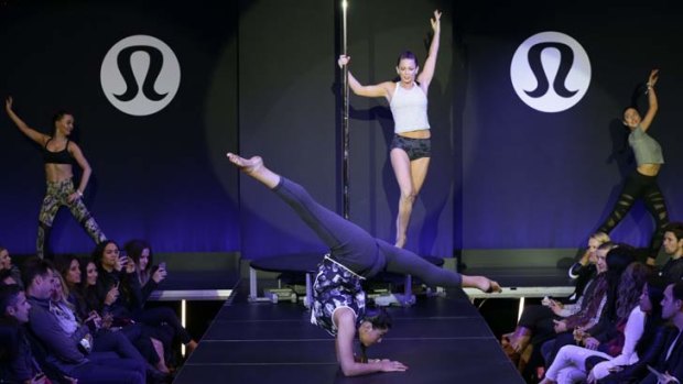 Acrobats featured in Lulemon Athletica's electric runway show.