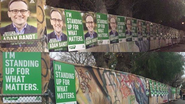 Greens posters on Best Street in Fitzroy North, on Friday night (above) and on Saturday morning (below).