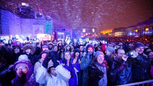 Crowds converge for the Montreal en Lumiere celebration.