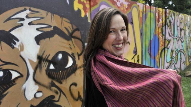 Susanna Bevilacqua, a banker and founder of Fair@Square, wears a fair trade scarf from Laos.