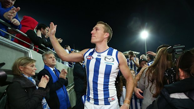 Kangaroo Drew Petrie farewells fans after the loss.