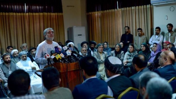 Afghan presidential candidate Abdullah Abdullah tells a packed press conference that he will refuse to accept the election results until he is convinced they are free of fraud.