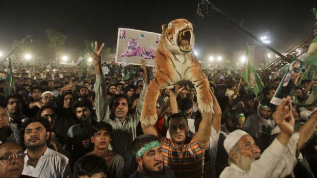 Final push: supporters of  Prime Minister Nawaz Sharif at an election rally in Lahore on Thursday.