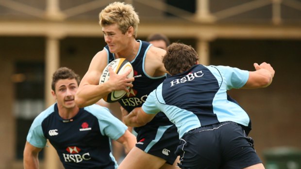 Barnstorming run...Berrick Barnes has been enjoying his pre-season time with the Waratahs and thinks the team is a strong chance for a Super 12 title.