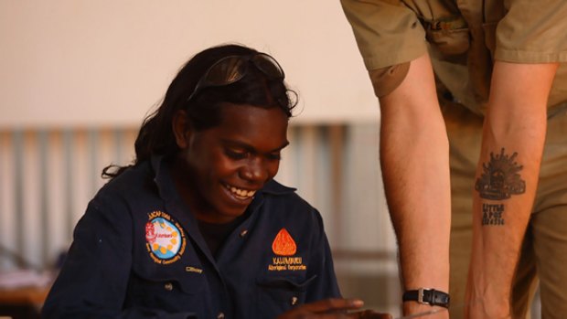 The healing has begun: Jasmine Achue and her army engineers mentor Sapper Keone Little at Kalumburu, WA.
