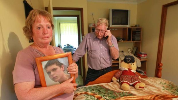 Heartache ... Sandra and David Auchterlonie with a photo of their grandson David, who was murdered by Matthew Milat and Cohen Klein with an axe.