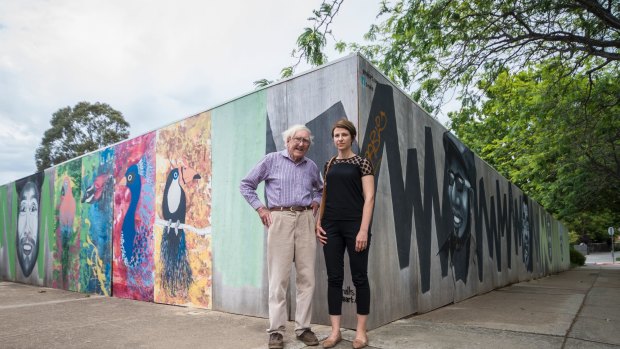 Historian Alan Foskett and resident Luisa Capezio on the old service station site at the Campbell shops. No development application has yet been lodged but the developer is considering either a six-storey complex with commercial tenancies and residences or a four-storey townhouse complex.