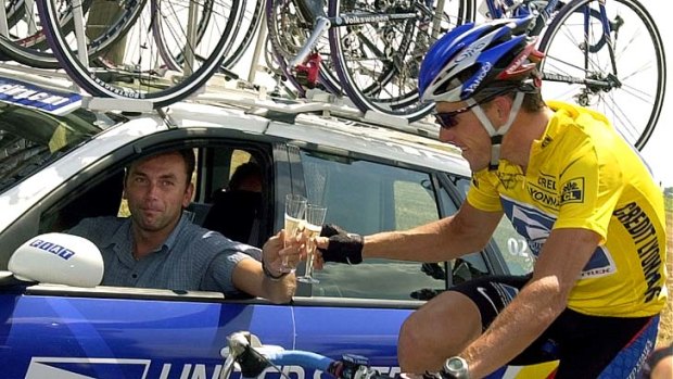 Bitter aftertaste &#8230; Lance Armstrong and Johan Bruyneel toast a Tour de France success in 2002.