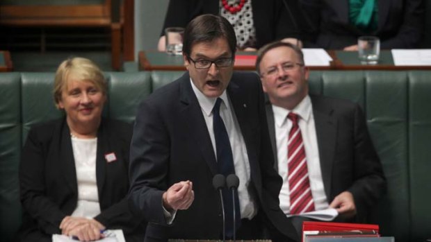 Tense climate ... a spokesperson for the Climate Change Minister, Greg Combet, said that Canada was still doing its part to slash emissions despite withdrawing from the 1997 Kyoto Protocol.