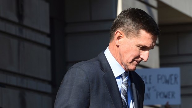 Former Trump national security adviser Michael Flynn leaves federal court in Washington, Friday, Dec. 1, 2017. Flynn pleaded guilty Friday to making false statements to the FBI, the first Trump White House official to make a guilty plea so far in a wide-ranging investigation led by special counsel Robert Mueller. (AP Photo/Susan Walsh)
