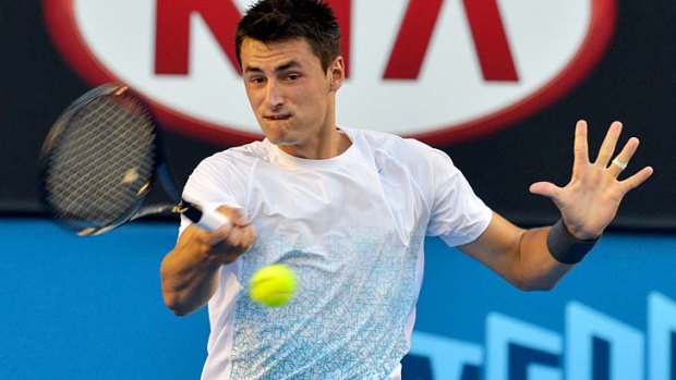 Easy does it: Bernard Tomic during his first-round win.