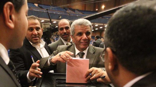 Committed to forming a representative body ... Sobhi Saleh of the Muslim Brotherhood cast his vote to elect the new members of a panel to draft Egypt's new constitution.