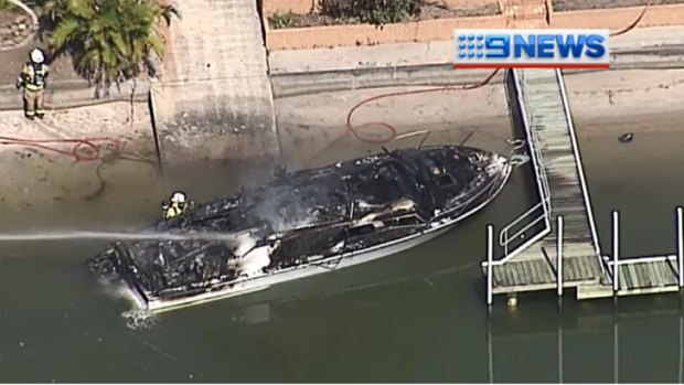 The charred hull of a boat which burst into flames on the Gold Coast. Photo: Nine News.
