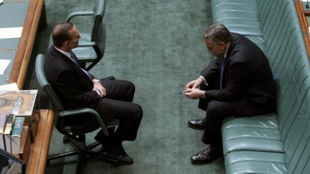 Hard sell: Prime Minister Tony Abbott and the Treasurer Joe Hockey  at Parliament House.
