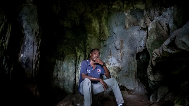 Hassaballa Hassaballa, a Sudanese refugee, in a cave locals used as shelter during World War II, on Los Negros Island near Manus.