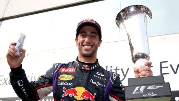 Daniel Ricciardo with his winner's trophy.