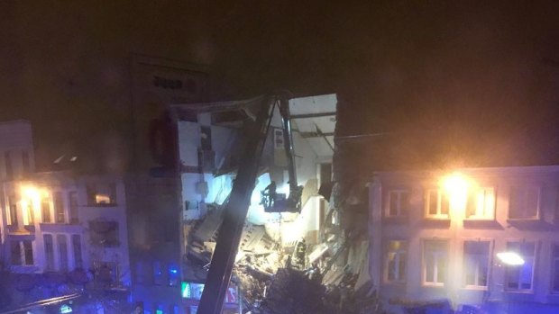 This image taken from the Twitter page of Sigrid Vermeulen shows a collapsed building in Antwerp, Belgium, Monday Jan. 15, 2018. (Sigrid Vermeulen via AP)