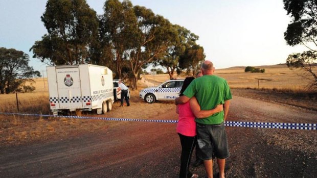 The scene near the home where the bodies were found.