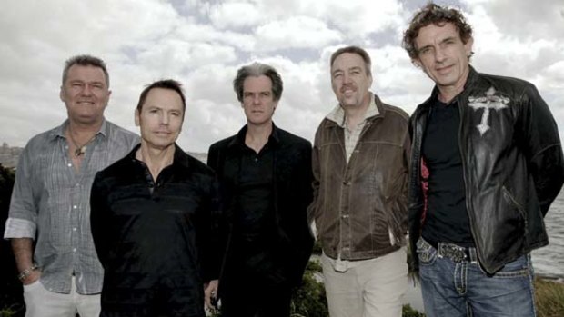 Steve Prestwich, second right, has died after surgery to remove a brain tumour. Here he is pictured with his Cold Chisel band mates in December 2009.