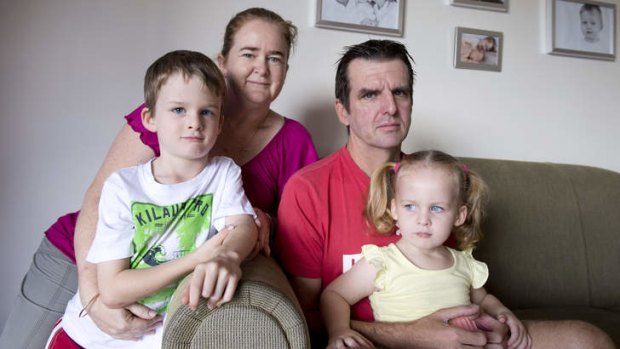 Cystic Fibrosis sufferer Paul McKean with his wife Janine, son Oscar,5, and daughter Kate,3, at their home in Brisbane.