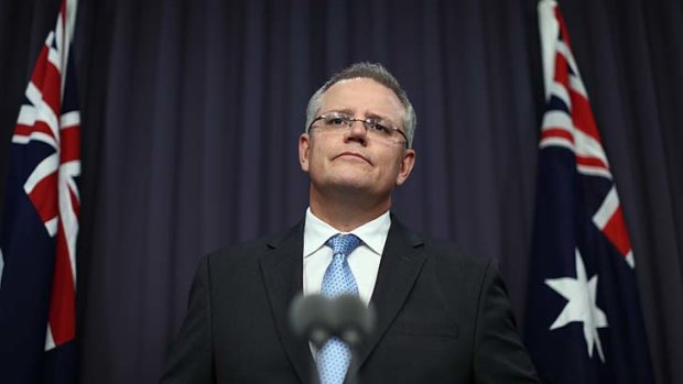 Immigration Minister Scott Morrison addresses the media on Monday about the first Manus Island breakout at the weekend.