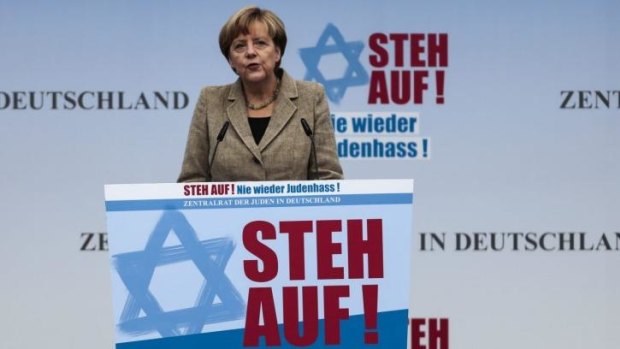 German Chancellor Angela Merkel delivers her speech at a rally against anti-Semitism near the Brandenburg Gate on Sunday.