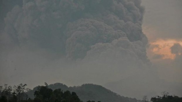 Mount Kelud erupting, as seen from Mbalak village in East Java.