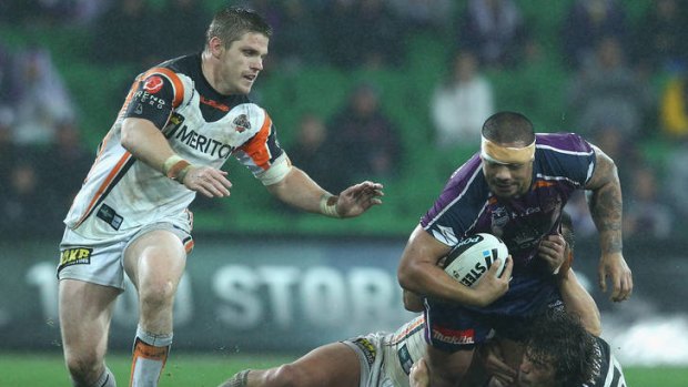 Bullocking: Sika Manu was back doing what he does best for the Storm in Friday's loss to West Tigers.
