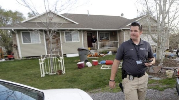 Pleasant Grove police investigate the scene where seven infant bodies were discovered in Utah.