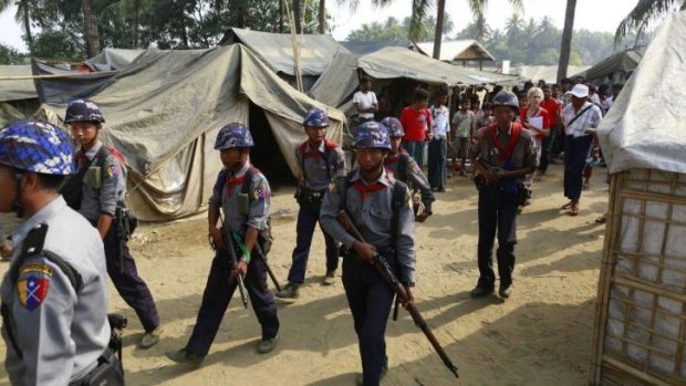 Police arrive in a refugee camp for internally displaced Rohingyas in Myanmar's Rakhine state ahead of the controversial census. 