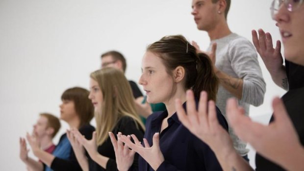 Gesture: A Swedish sign language choir sings Serenade to Music in Angelica Mesiti's The Colour of Saying.