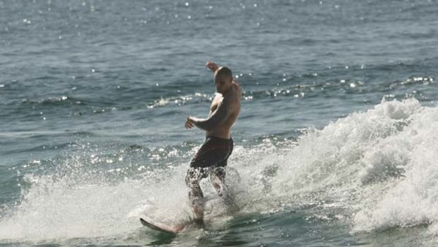 Time  to unwind ... Jeremy Smith enjoys a surf in Wollongong after helping the Dragons to secure a place in the grand final.