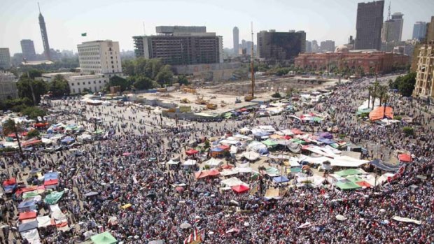 Historic day ... thousands of supporters of the Muslim Brotherhood and newly elected president, Mohamed Mursi take to the streets in celebration.