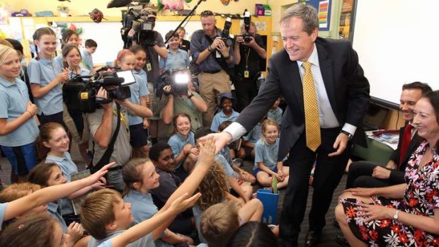 Opposition Leader Bill Shorten meets with students from Ainslie Primary School in Canberra on Thursday.