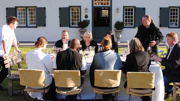 Delicious ... chef Neil Perry enjoys a South African braai and wines at Grande Provence Estate.