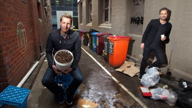 Joost Bakker and Danny Colls use a dehydrator to recycle all the waste from their cafe in Hardware Street, Melbourne.