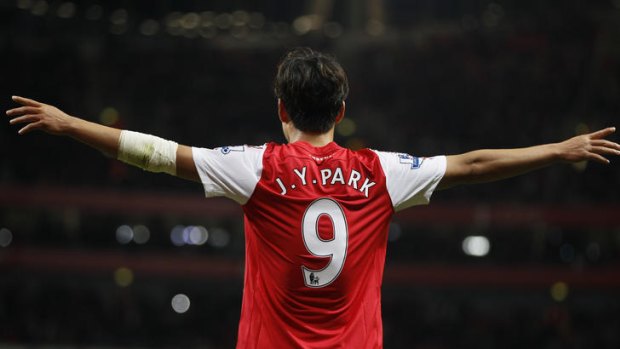 Arsenal's Ju Young Park celebrates his winning goal.