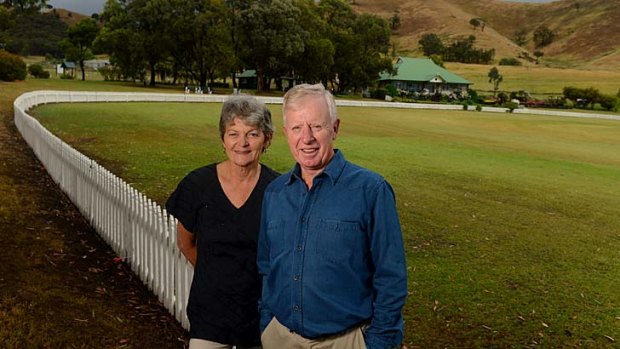 What have we done? Ros and John Rogers, parents of Test batsman Chris, at their new home - and new homeground - at Strath Creek.