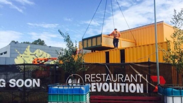 Shipping containers have been craned in to the Oxford Street site.