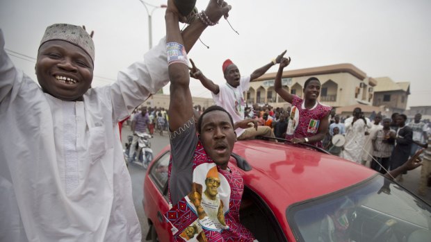 Muhammadu Buhari's supporters celebrate in Kano, Nigeria, on Tuesday.