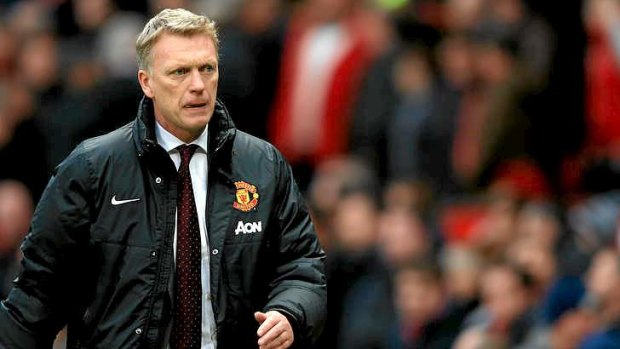 Under pressure: Manchester United manager David Moyes looks dejected after the match.