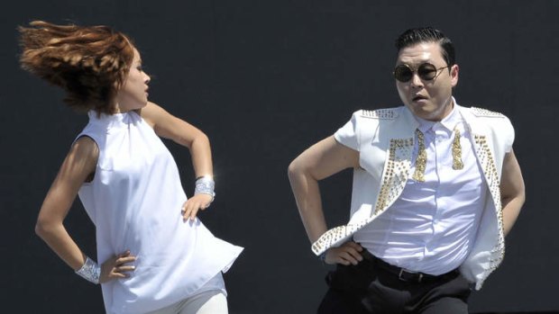 South Korean pop sensation PSY (right) will front a new tourism campaign for South Korea.