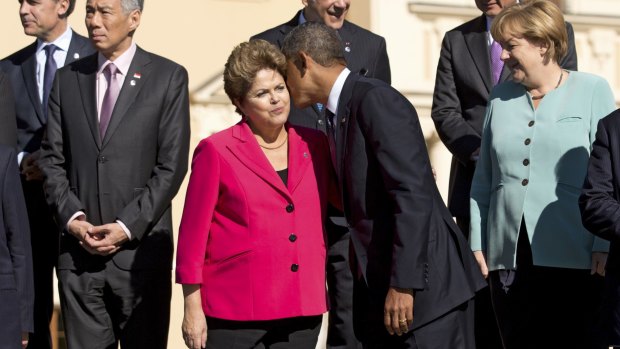 Some female leaders, such as Brazilian President Dilma Rousseff, being met by US President Barack Obama, and German Chancellor Angela Merkel, have tweaked the male uniform by expanding the colour range while keeping within a traditional framework.