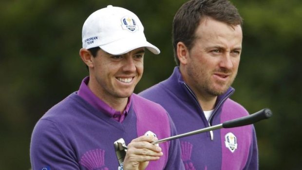 McIlroy and McDowell look friendly enough during practice.